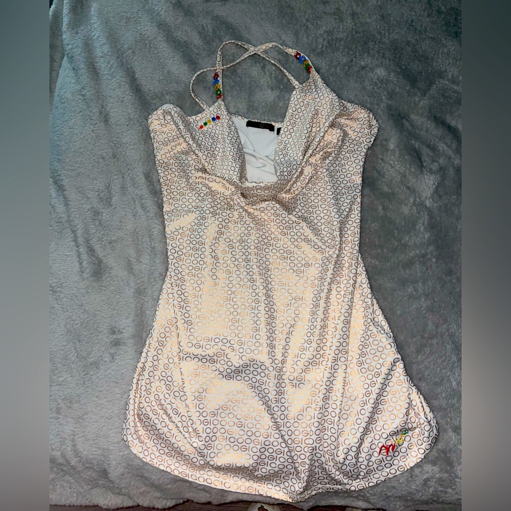 Authentic COOGI dress. Short mini and  sexy stretchy gold COOGI print.